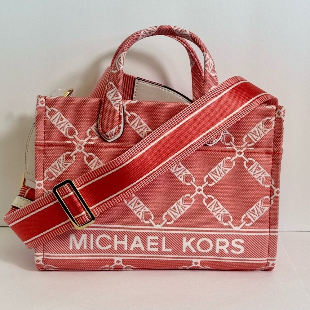 MICHAEL KORS small East West messenger two way bag color spiced coral NWT